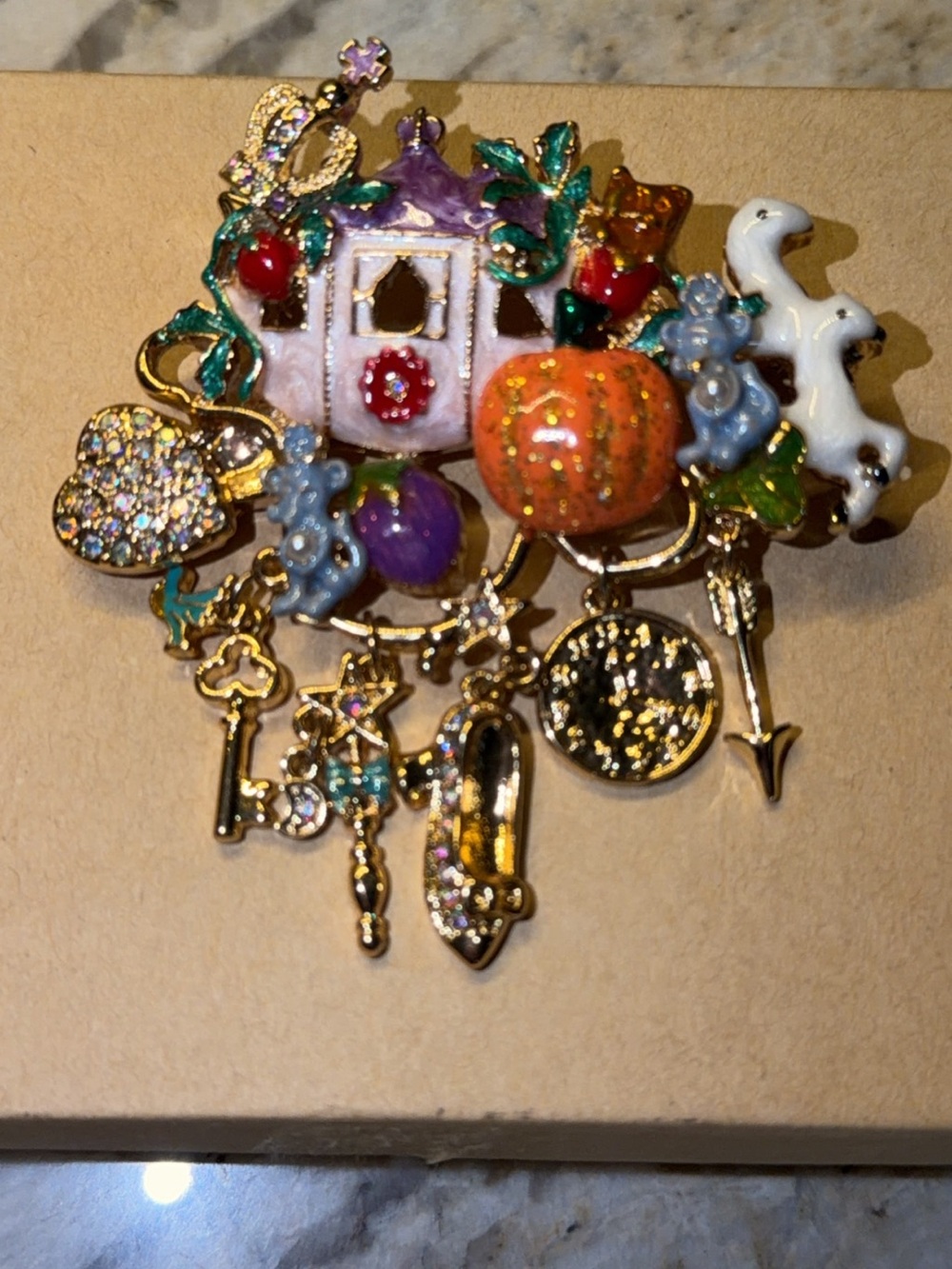 Kirks Folly Cinderella Carriage Gold Tone AB rhinestones and dangling charms